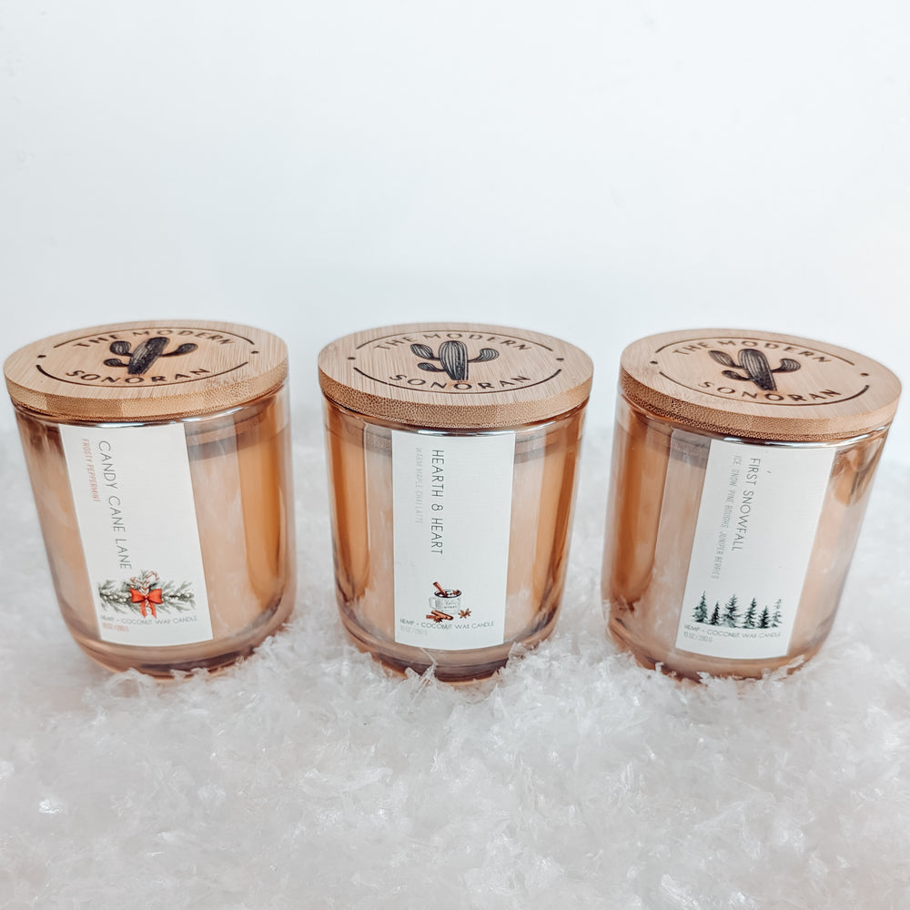 holiday candles
Celebrate the magic of the season with our Winter Candles, featuring three christmas candles to warm your home. Hearth & Heart wraps you in the cozy embrace of small-batch maple syrup, chai spices, and frothy oat milk, evoking the comfort of a steaming latte by the fire. Candy Cane Lane brings a refreshing burst of cool peppermint and creamy sweetness, reminiscent of festive treats and holiday cheer. First Snowfall captures the serene beauty of a winter morning with crisp, clean notes.