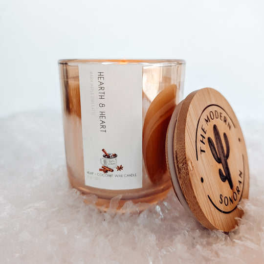 Wrap your hands around a steaming cup of comfort with the warm, inviting aroma of our Maple Chai Latte candle. A perfect blend of freshly harvested maple syrup and the cozy spices of chai—cinnamon, cardamom, and cloves—this scent feels like a soft blanket on a snowy morning. Notes of creamy vanilla and frothy steamed oat milk add a luscious depth. This candle is in an champagne colored, iridescent reusable jar. Made of our own hemp wax! the best unique christmas gift!