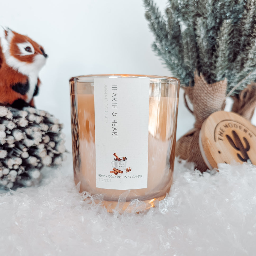 Wrap your hands around a steaming cup of comfort with the warm, inviting aroma of our Maple Chai Latte candle. A perfect blend of freshly harvested maple syrup and the cozy spices of chai—cinnamon, cardamom, and cloves—this scent feels like a soft blanket on a snowy morning. Notes of creamy vanilla and frothy steamed oat milk add a luscious depth. This candle is in an champagne colored, iridescent reusable jar. Made of our own hemp wax! 