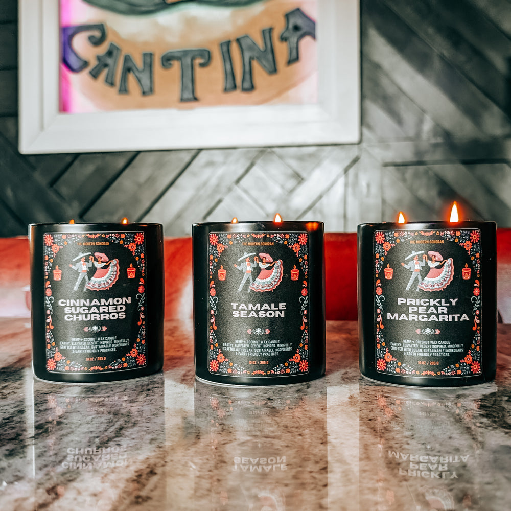The southwestern Fiesta Candle Collection - a celebration of hispanic cultural influence on the United States Southwest. 3 festive, lively scented candles inspired by arizona living: prickly pear margarita, tamale season, and cinnamon sugared churros complete this southwestern candle collection. Mindfully crafted with clean, sustainable ingredients & earth friendly practices. Earthy, yet elevated candles for modern southwestern living.