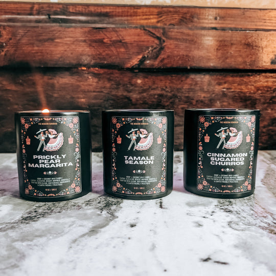 The southwestern Fiesta Candle Collection - a celebration of hispanic cultural influence on the United States Southwest. 3 festive, lively scented candles inspired by arizona living: prickly pear margarita, tamale season, and cinnamon sugared churros complete this southwestern candle collection. Mindfully crafted with clean, sustainable ingredients & earth friendly practices. Earthy, yet elevated candles for modern southwestern living.