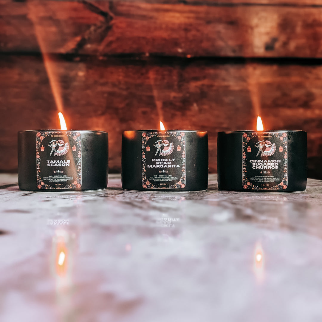 The southwestern Fiesta Candle Collection - a celebration of hispanic cultural influence on the United States Southwest. 3 festive, lively scented candles inspired by arizona living: prickly pear margarita, tamale season, and cinnamon sugared churros complete this southwestern candle collection. Mindfully crafted with clean, sustainable ingredients & earth friendly practices. Earthy, yet elevated candles for modern southwestern living.