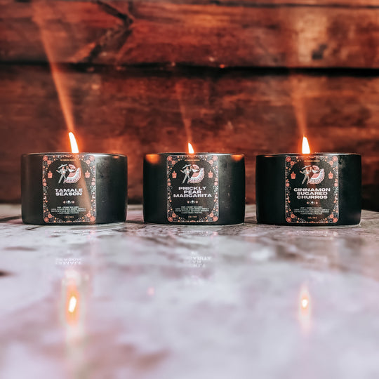 The southwestern Fiesta Candle Collection - a celebration of hispanic cultural influence on the United States Southwest. 3 festive, lively scented candles inspired by arizona living: prickly pear margarita, tamale season, and cinnamon sugared churros complete this southwestern candle collection. Mindfully crafted with clean, sustainable ingredients & earth friendly practices. Earthy, yet elevated candles for modern southwestern living.