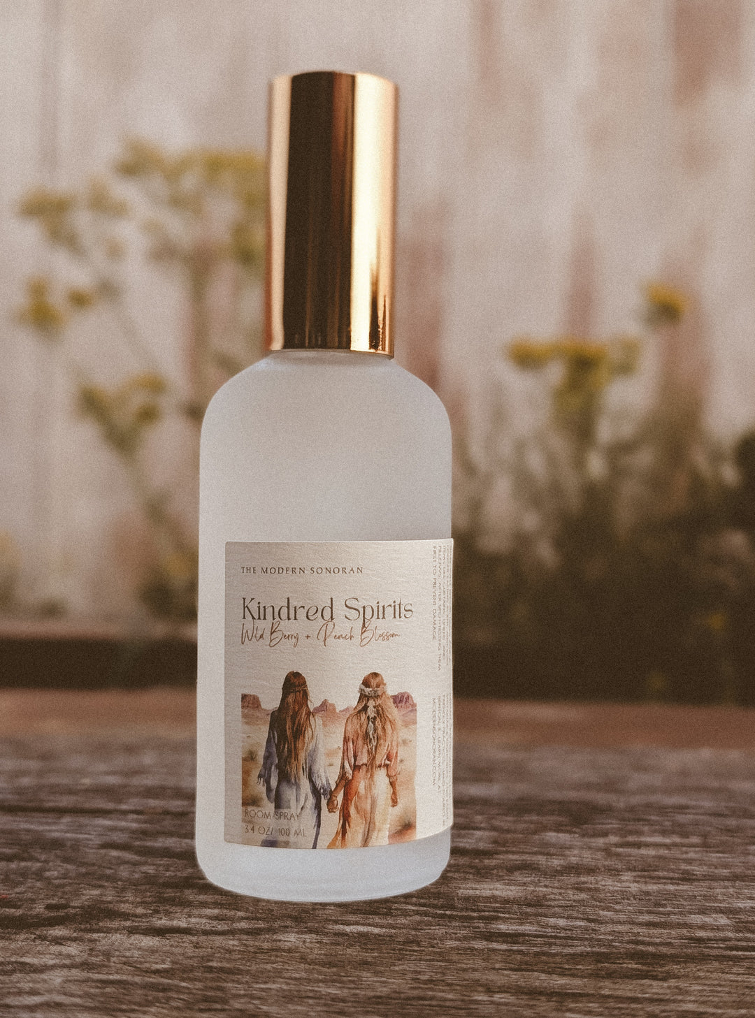 A  Kindred Spirits Room Spray: (Limited Edition) from The Modern Sonoran on a table