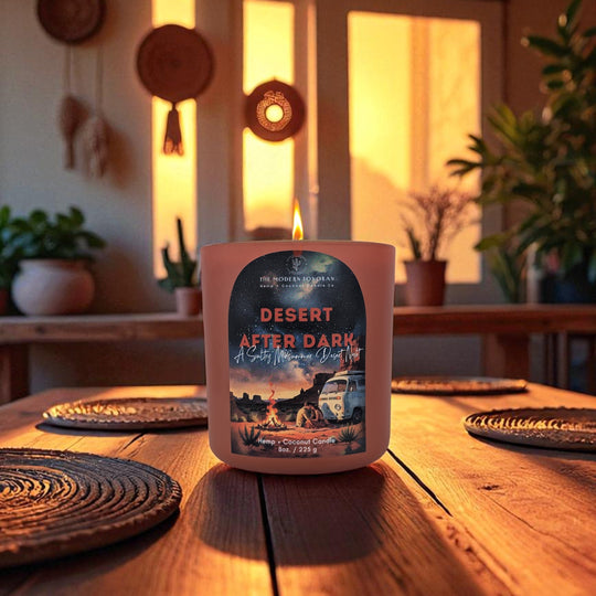 Clean non toxic candle labeled 'Desert After Dark' on a southwestern wooden table with a warm, homey background. Best Arizona high desert boho western decor.