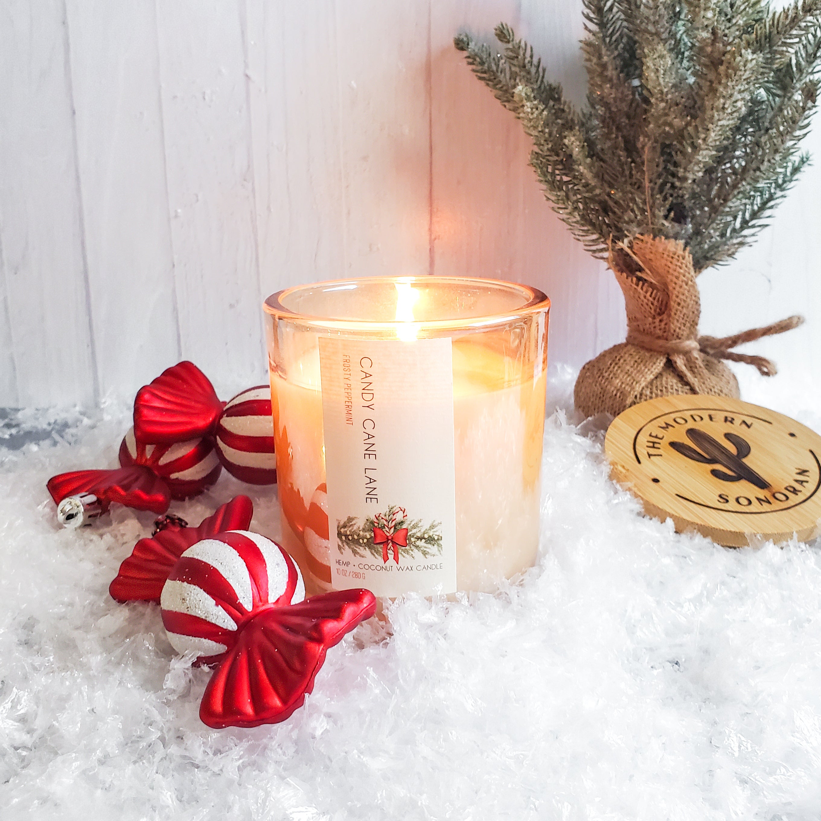 This candle is pure holiday magic, bringing the sparkle of winter evenings and the warmth of peppermint cheer straight to your home. Light it up and let the memories of cookie exchanges with your favorite ladies and festive holiday shopping delight you. It makes the best unique gift! Hem Wax Candle, Champagne color Jar.