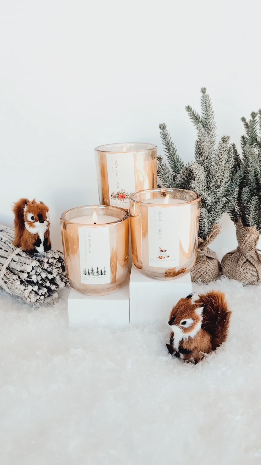 holiday candles
Celebrate the magic of the season with our Winter Candles, featuring three christmas candles to warm your home. Hearth & Heart wraps you in the cozy embrace of small-batch maple syrup, chai spices, and frothy oat milk, evoking the comfort of a steaming latte by the fire. Candy Cane Lane brings a refreshing burst of cool peppermint and creamy sweetness, reminiscent of festive treats and holiday cheer. First Snowfall captures the serene beauty of a winter morning with crisp, clean notes.