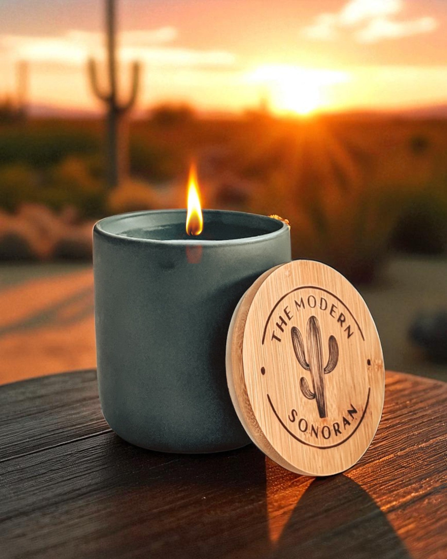 Candle  with a wooden lid featuring 'The Modern Sonoran' logo, set against a desert sunrise. Best selling coffee candle. Best candle for coffee lovers. Best gift for coffee lovers.